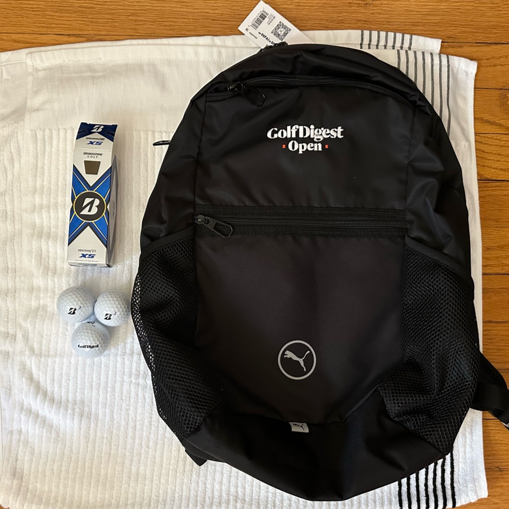 Black Golf Digest COBRA/Puma Backpack + 1 Sleeve Bridgestone Tour BX5 Golf Balls
